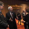 Dana Davis, second from left, incoming chamber president chats Thursday with Tom Ginn, left and Boot...