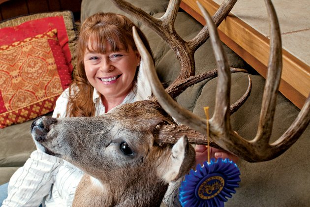 kimberly-holbrook-of-pottsville-had-the-highest-scoring-white-tailed-buck-in-the-ladies-typical-division-at-the-arkansas-big-buck-classic-this-year-with-this-deer-that-scored-152-38-boone-crockett-points
