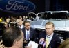 Alan Mulally, president and chief executive officer of Ford Motor Co., speaks to the media after the unveiling of the F-150 Atlas concept truck during the 2013 North American International Auto Show (NAIAS) in Detroit, Michigan, U.S., on Tuesday, Jan. 15, 2013. Ford Motor Co., trying to fend off new pickups from competitors targeting its top-selling F-Series, showed an F-150 prototype with features that boost fuel economy and foreshadow its future for the segment. Photographer: David Paul Morris/Bloomberg *** Local Caption *** Alan Mulally