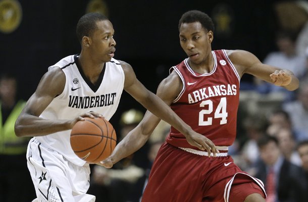 vanderbilt-forward-rod-odom-left-drives-against-arkansas-guard-michael-qualls-24-during-the-first-half-of-an-ncaa-college-basketball-game-saturday-feb-9-2013-in-nashville-tenn-ap-photomark-humphrey