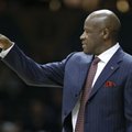 Arkansas head coach Mike Anderson motions to his players in the first half of an NCAA college basket...