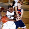 Bentonville’s Jamayne Potts, left, is fouled by Rogers Heritage senior Ellen Lundy as she pulls down...