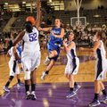 Rogers’ McKinzie James takes a shot in the lane as Fayetteville’s Brittany Austin, left, and Sydney ...