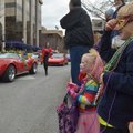 Gabe Vetter, 8, and sister Lia Vetter, 3, both of Fayetteville, look for more beads Saturday to add ...