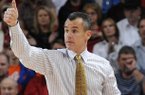 Florida's Billy Donovan, head coach, gives a thumbs up to players Tuesday, Feb. 5, 2013, at Bud Walton Arena in Fayetteville. The Gators were one of the four, top-five teams to be upset last week.