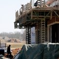 Construction continues Friday on Bliss Cupcake Cafe on Promenade Boulevard in Rogers. More than half...