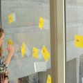 Lauren Diehl of Rogers takes a moment to participate in a St. Valentine’s Day collaborative art proj...