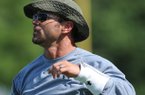 Brian Early watches during a Fayetteville Bulldogs scrimmage Aug. 8 at Harmon Field.