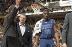 Mississippi's Reginald Buckner, right, is escorted off the court after being ejected during the second half of an NCAA college basketball game against Missouri on Saturday, Feb. 9, 2013, in Columbia, Mo. Missouri won 98-79. (AP Photo/L.G. Patterson)