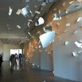 Attendees of the 21c Museum Hotel walk past 