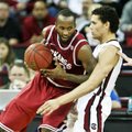 Marshawn Powell (left) has struggled to stay out of foul trouble in road games this season.