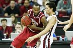 Marshawn Powell (left) has struggled to stay out of foul trouble in road games this season.