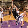 Bentonville's Taylor Lee (12) reaches to score as Fayetteville's Taylor Crockett defends during the ...