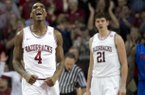 Arkansas' Coty Clarke (4) celebrates during the second half of the Razorbacks' 80-69 win over Florida in Tuesday, Feb. 5, 2013. A few more quality victories may be all Arkansas needs to make the NCAA Tournament.