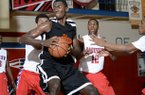 Hall's Bobby Portis spins around as he moves for the basket during the Hall-Parkview game held Tuesday night at Parkview High School.
