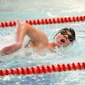 Springdale Har-Ber’s John Kirchner competes in the 500-yard freestyle on Jan. 31 during the Bentonvi...