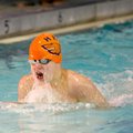 Rogers Heritage’s Ian Pusey swims in the 100 breaststroke on Jan. 31 during the Bentonville Invitati...