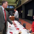 Sean Rochelle (left), pictured in this 2009 file photo with former Arkansas basketball coach John Pe...