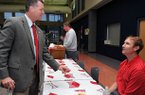 Sean Rochelle (left), pictured in this 2009 file photo with former Arkansas basketball coach John Pelphrey, has worked with the Razorback Foundation since 2008. 