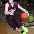 Cole Frick of Huntsville High School drives towards the lane Tuesday, Feb. 12, 2013, during the game...