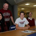 McKinzie James, second from right, signed a national letter of intent to play soccer for the Arkansa...