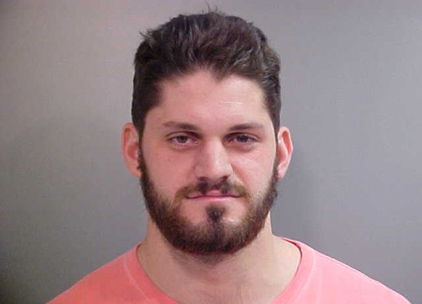austin-flynn-a-defensive-end-for-the-razorbacks-football-team-was-arrested-wednesday