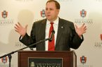 University of Arkansas Senior Associate Athletic Director of Development Chris Wyrick speaks during a press conference Wednesday morning in Fayetteville.