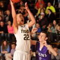 Trusten DeSoto of West Fork pulls up for a jump shot over Elkins defender Trevor Deloney during Wedn...