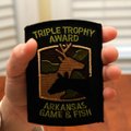 Davis got a certificate and a patch for winning the Triple Trophy Award for deer hunting. 
