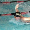 Logan Smith of Bentonville swims the fly in the 200-yard individual medley Wednesday during the NWA ...