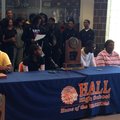 Hall basketball players Bobby Portis (right, center) and Tyler Scaife (left, center) accepted invita...