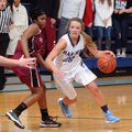 Caylee Wright, right, of Springdale Har-Ber drives around Baiyinnah Taylor of Springdale High during...