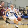 Callie King, right, of Rogers High takes the ball down the court against Siloam Springs on Jan. 8 at...