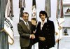 President Richard Nixon meets Elvis Presley on March 2, 1971, and gives him a framed and autographed Presidents’ Day proclamation. 