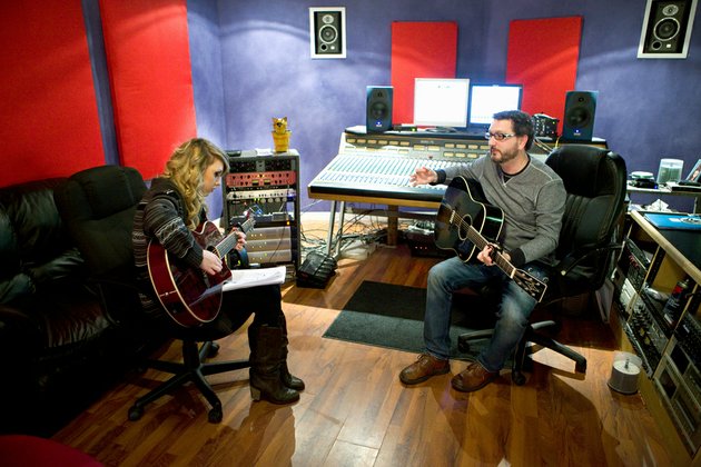 crystal-gray-left-works-on-arranging-one-of-her-songs-with-darian-stribling-at-blue-chair-recording-studio-in-austin-gray-is-an-aspiring-musician-who-regularly-works-with-stribling-to-develop-her-musical-abilities