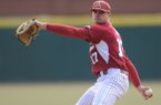 Arkansas pitcher Barrett Astin delivers a pitch Saturday, Feb. 16, 2013, during the second inning of the Hogs' win over Western Illinois at Baum Stadium in Fayetteville.