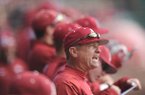 Arkansas coach Dave Van Horn directs his players Saturday, Feb. 16, 2013, during the third inning of the Hogs' win over Western Illinois at Baum Stadium in Fayetteville.