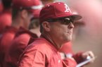 Arkansas coach Dave Van Horn directs his players Saturday, Feb. 16, 2013, during the third inning of the Hogs' win over Western Illinois at Baum Stadium in Fayetteville.