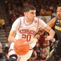 Arkansas junior guard Kikko Haydar (20) drives to the lane as Missouri junior guard Phil Pressey def...