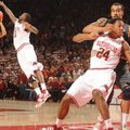 Arkansas freshman Michael Qualls and Missouri senior forward Laurence Bowers get tangled up in the l...