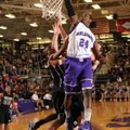 Jawan Smith, a Fayetteville senior guard, dunks a missed field goal attempt over the Springdale defe...