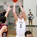 Nick Smith, a Bentonville senior, puts up a shot over Siloam Springs senior Payton Henson during the...