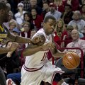 Arkansas guard BJ Young (11) drives to the basket against Missouri's Keion Bell (5) during the Razor...