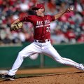 Arkansas pitcher Trent Daniel fires a pitch in the second inning of Sunday afternoon's game against ...