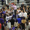 STAFF PHOTO ANDY SHUPE
Fayetteville coach Kyle Adams cuts the final strand of the net after the Bul...