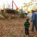 STAFF PHOTO ANDY SHUPEPete Heinzelmann, right, and his 6-year-old grandson Christopher Andersen wat...