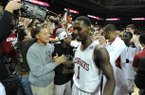 Arkansas junior guard Mardracus Wade (1) celebrates with the student section Saturday, Feb. 16, 2013, after the Hogs' win over Missouri in Bud Walton Arena in Fayetteville.