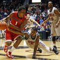 Mississippi guard Jarvis Summers (32) tries to steal the ball from Georgia guard Kentavious Caldwell...