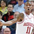 BJ Young reacts during the second half of Arkansas' win over Florida on Feb. 5. 