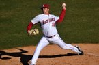Arkansas freshman Colin Poche delivers a pitch during the Razorbacks' 14-0 win over New Orleans in the first game of a doubleheader Tuesday at Baum Stadium in Fayetteville. 
